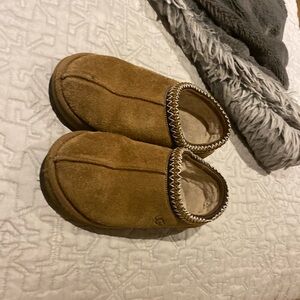 Dirty brown Ugg slippers